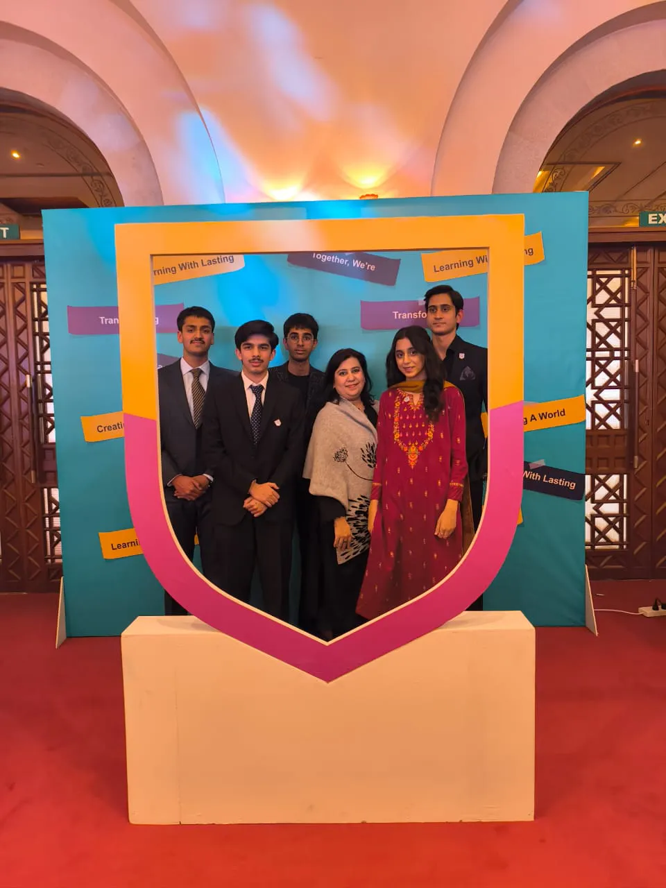 Duha Amir Uppal receiving award